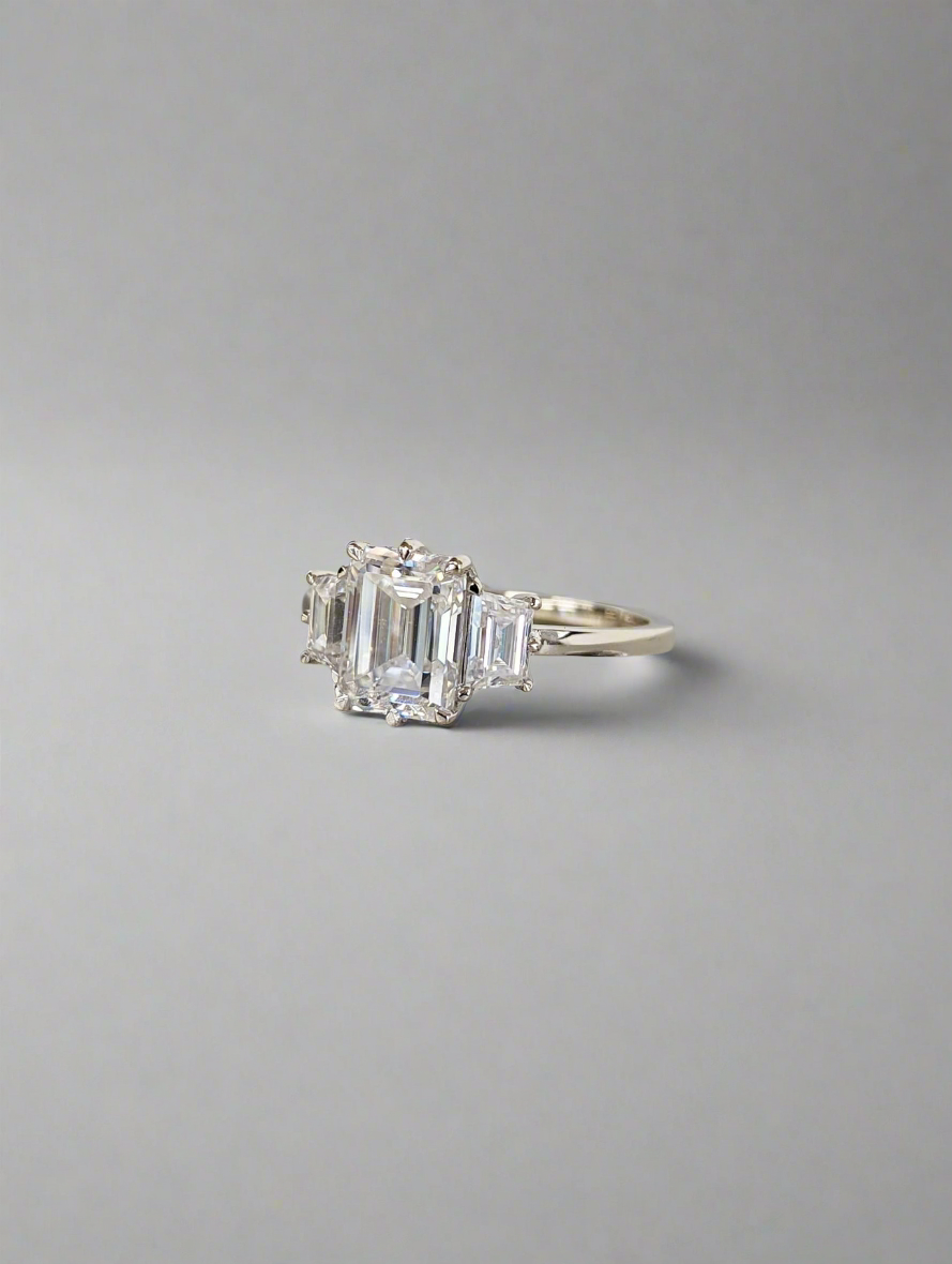 Engagement Ring - Emerald and Trapazoid Trilogy Moissanite Ring