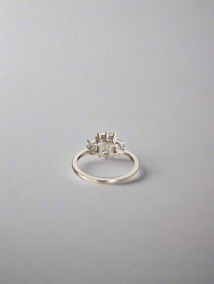 Engagement Ring - Emerald and Trapazoid Trilogy Moissanite Ring