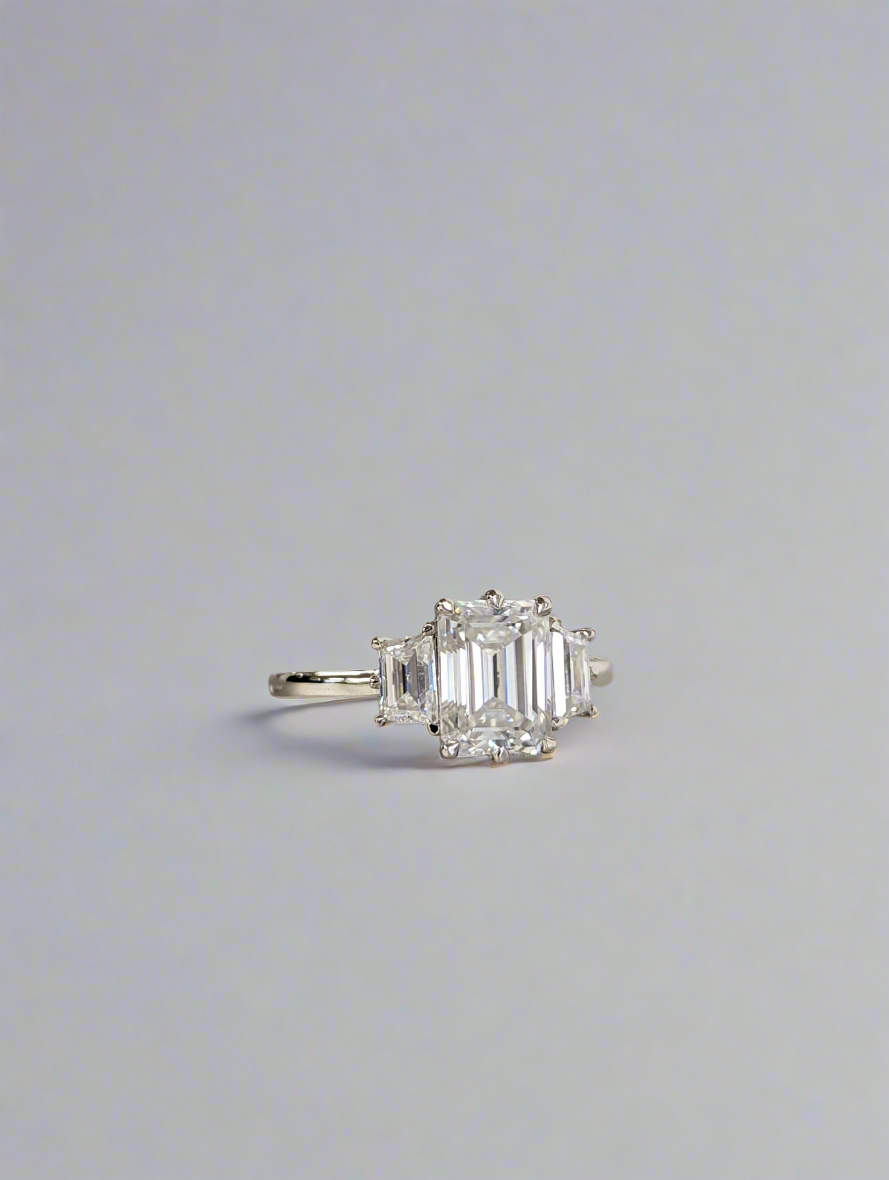Engagement Ring - Emerald and Trapazoid Trilogy Moissanite Ring
