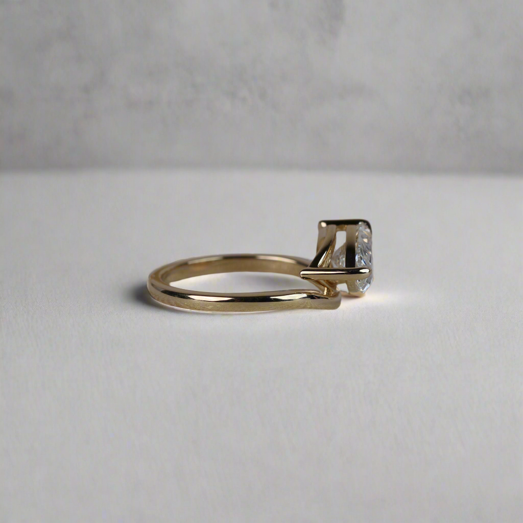 Engagement Ring - Floating Pear Shaped Moissanite