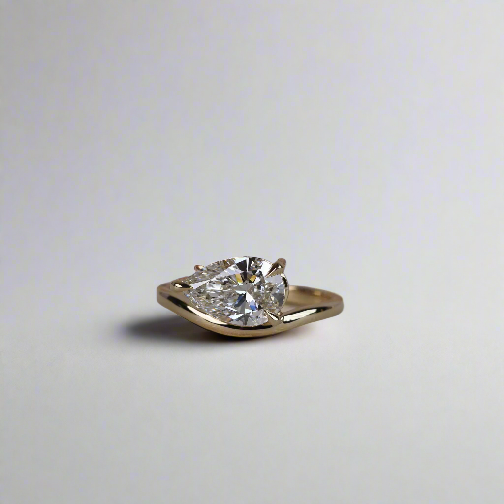 Engagement Ring - Floating Pear Shaped Moissanite