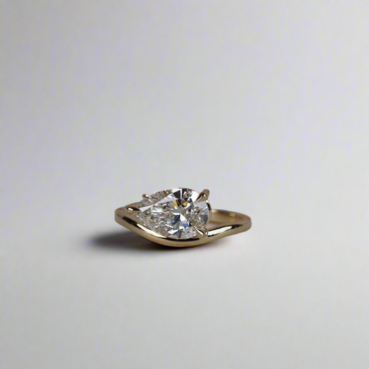 Engagement Ring - Floating Pear Shaped Moissanite