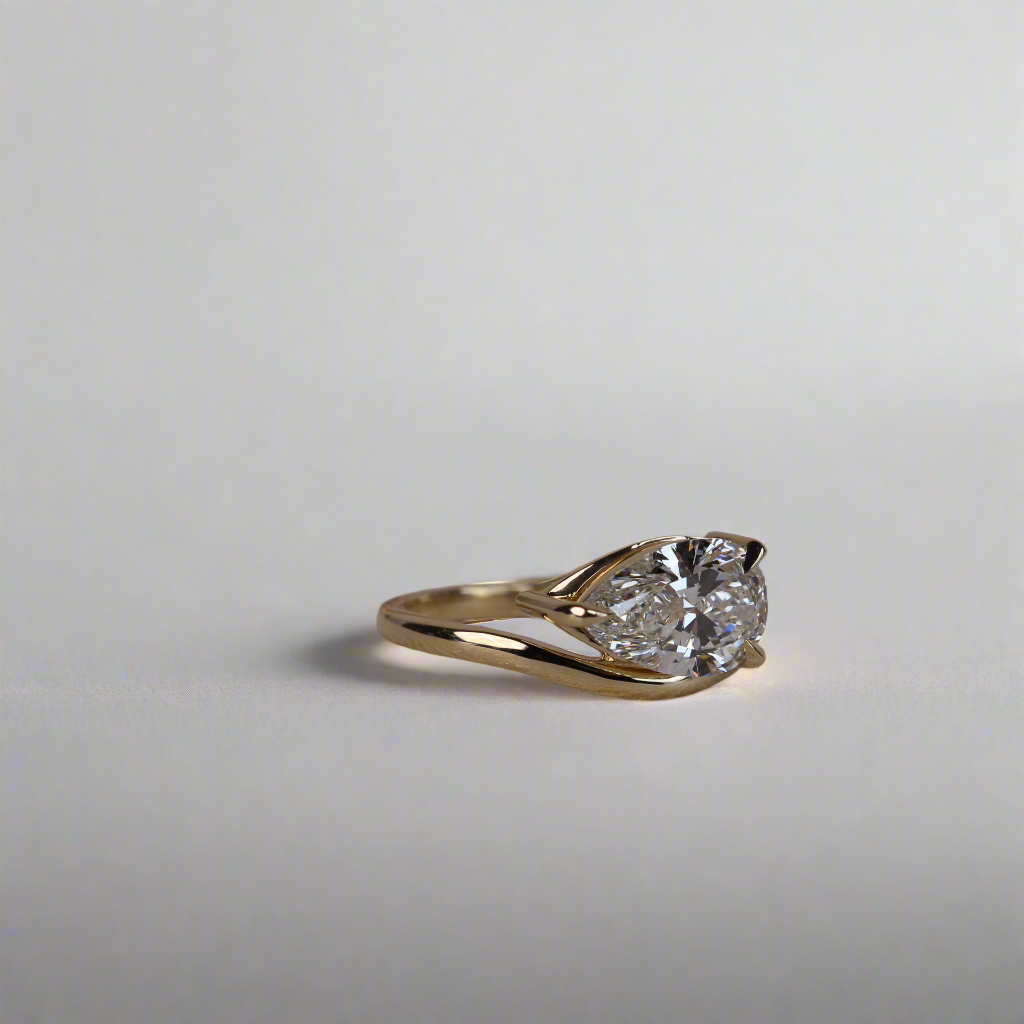 Engagement Ring - Floating Pear Shaped Moissanite
