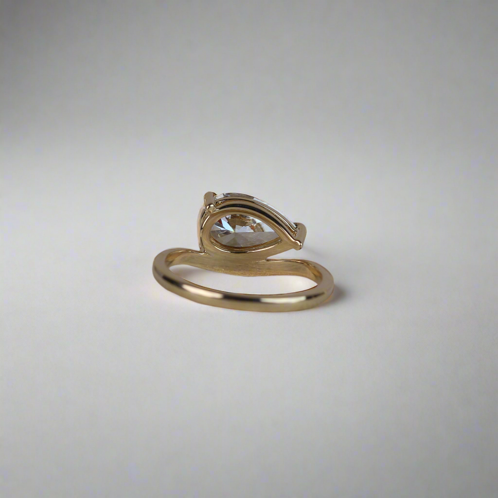 Engagement Ring - Floating Pear Shaped Moissanite