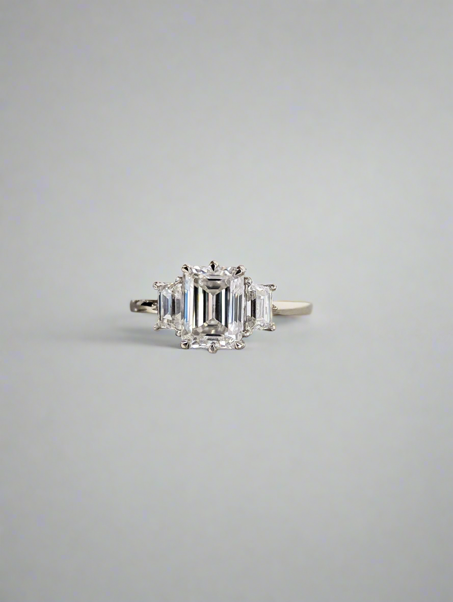 Engagement Ring - Emerald and Trapazoid Trilogy Moissanite Ring